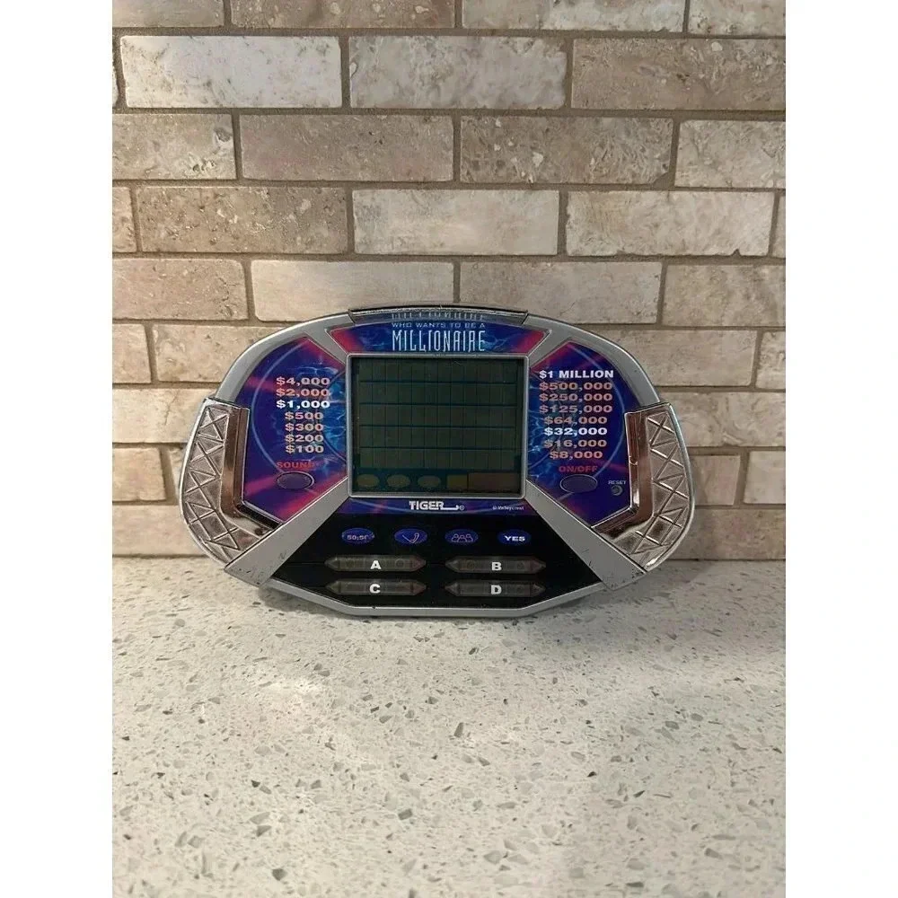 Who Wants To Be A Millionaire Game Electronic Handheld 2000 Tiger bj‎